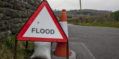 Flood sign on country road