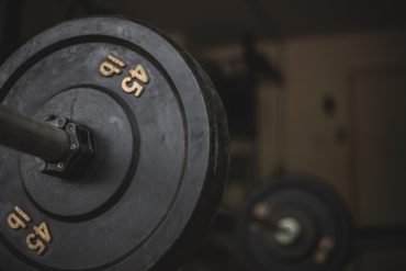 Weight training bar and weights