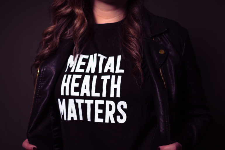 Woman with Mental Health Matters T-shirt