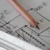 blueprints and pencil