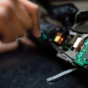 Person repairing an electronic device