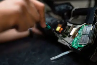 Person repairing an electronic device