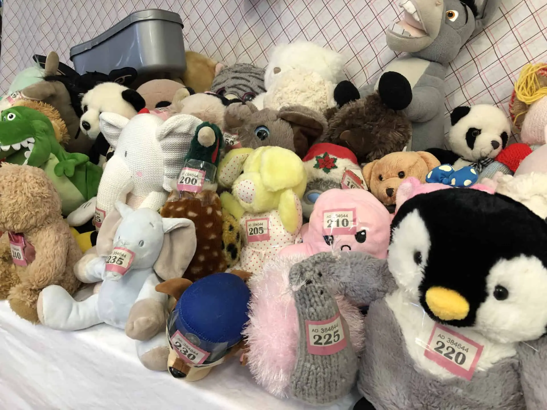 Soft toys laid out on the table at rotary sale