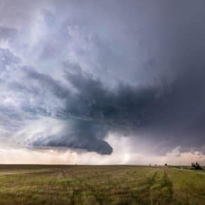 Storm clouds over fields by raychel sanner