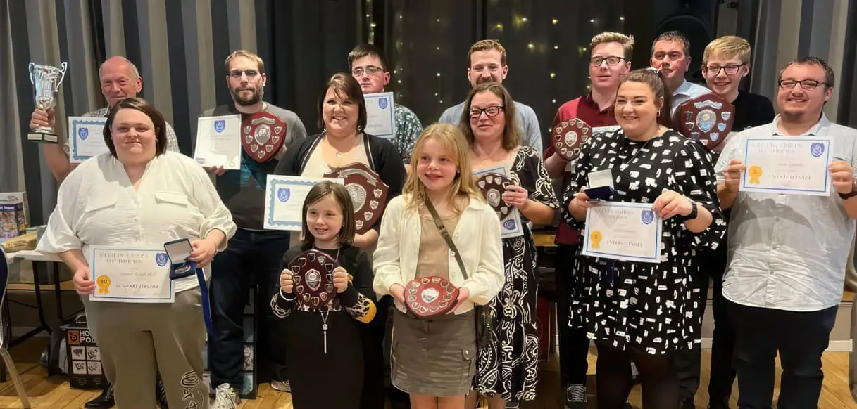 Vectis Corp of Drums award winners with their certificates and trophies