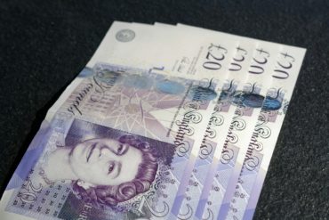 row of twenty pound notes