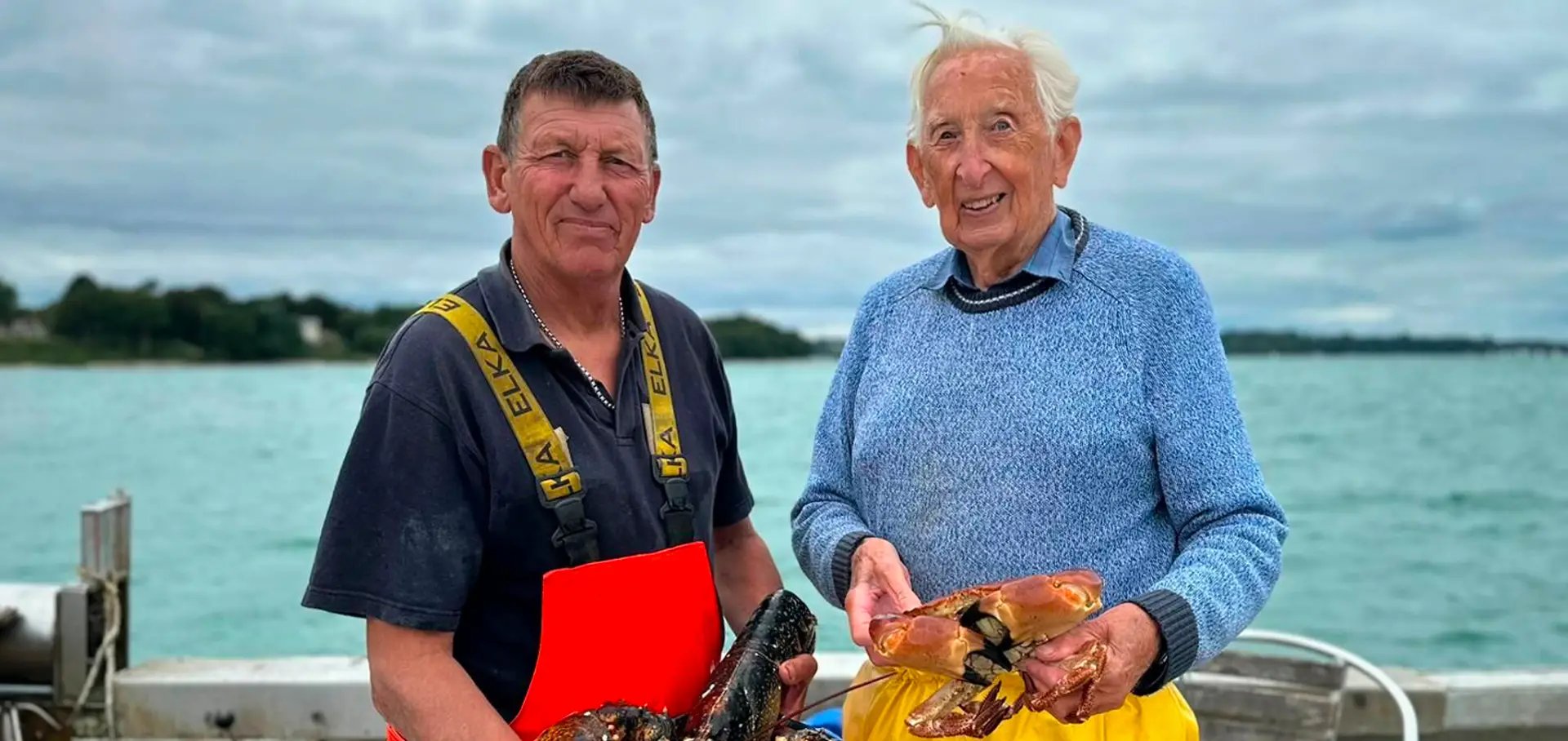 Fishermen with lobsters