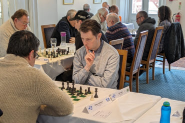 IW chess players competing