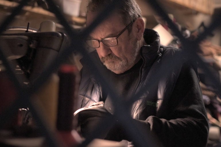 Kevin Garlick working in his shop