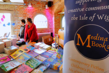 Medina Books stall in the cafe by Bob White
