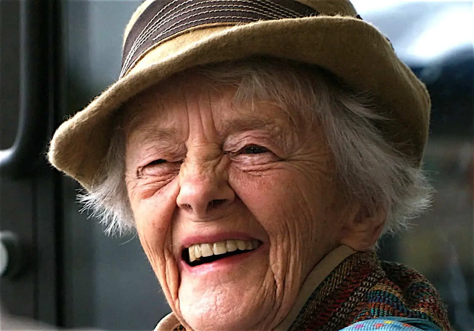Older woman smiling to the camera