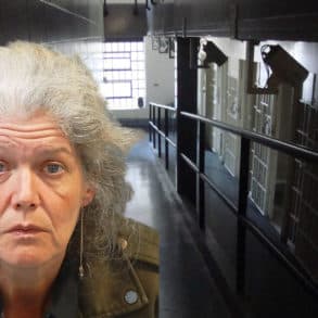 Mugshot of Amanda Realey with jail corridor in background