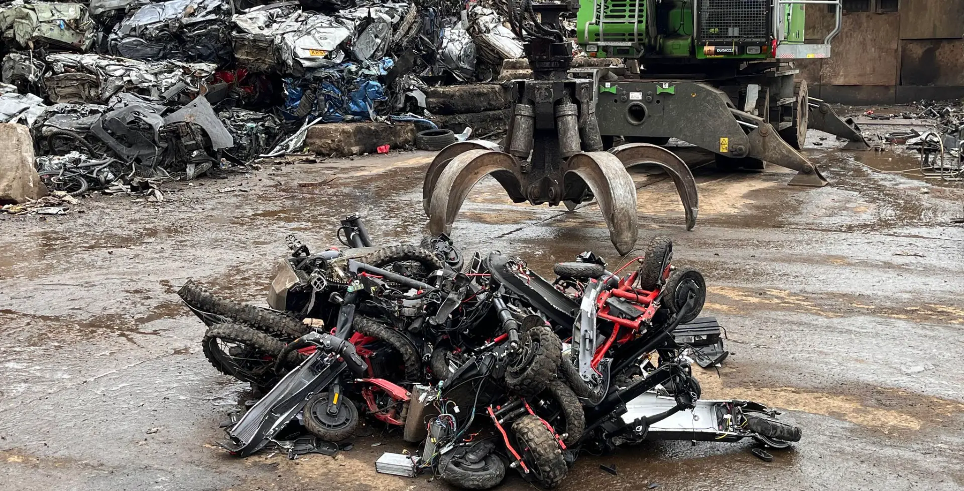 off road bikes and scooters ready to be crushed