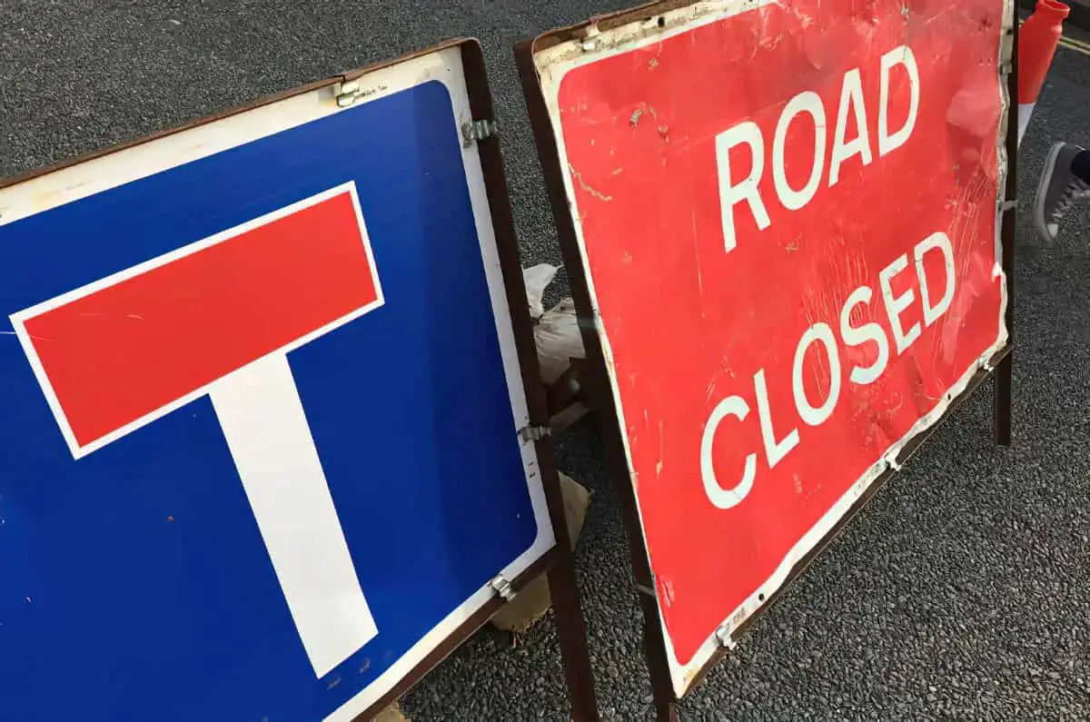 road closed and dead end sign