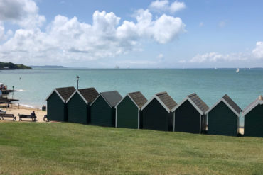 Gurnard free, with beach huts and the Solent in the distance