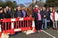 David Groocock and residents gathered at the barriers at Leeson Road