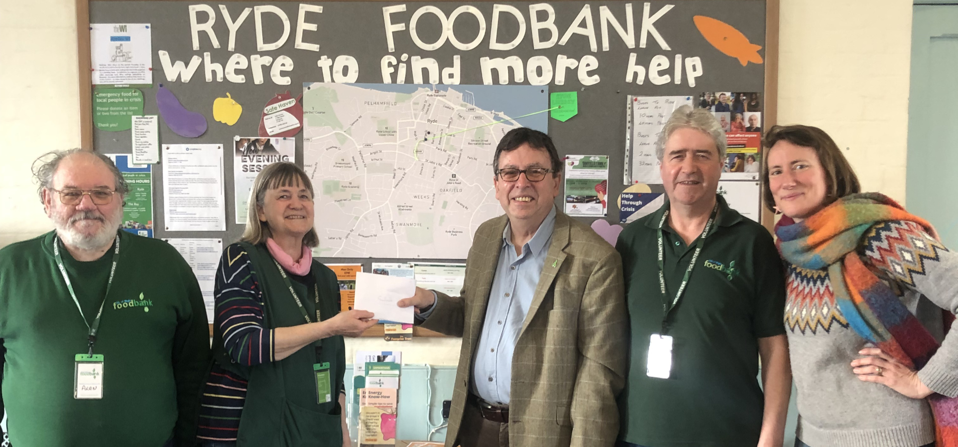 Michael presenting £370 to Ryde Foodbank to Ryde Foodbank team with Pippa Wayward, local resident in Ryde Appley and Elmfield Ward