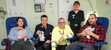 Mother, father, babies and staff at St Mary's Hospital