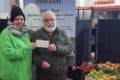 Myra Butcher – Ventnor Carnival Treasurer with John Mittelheuser of Ventnor Community Foodbank-hq-width-1299px