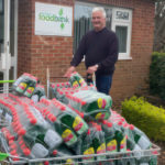 Steve Haines with trollies full with washing up liquid