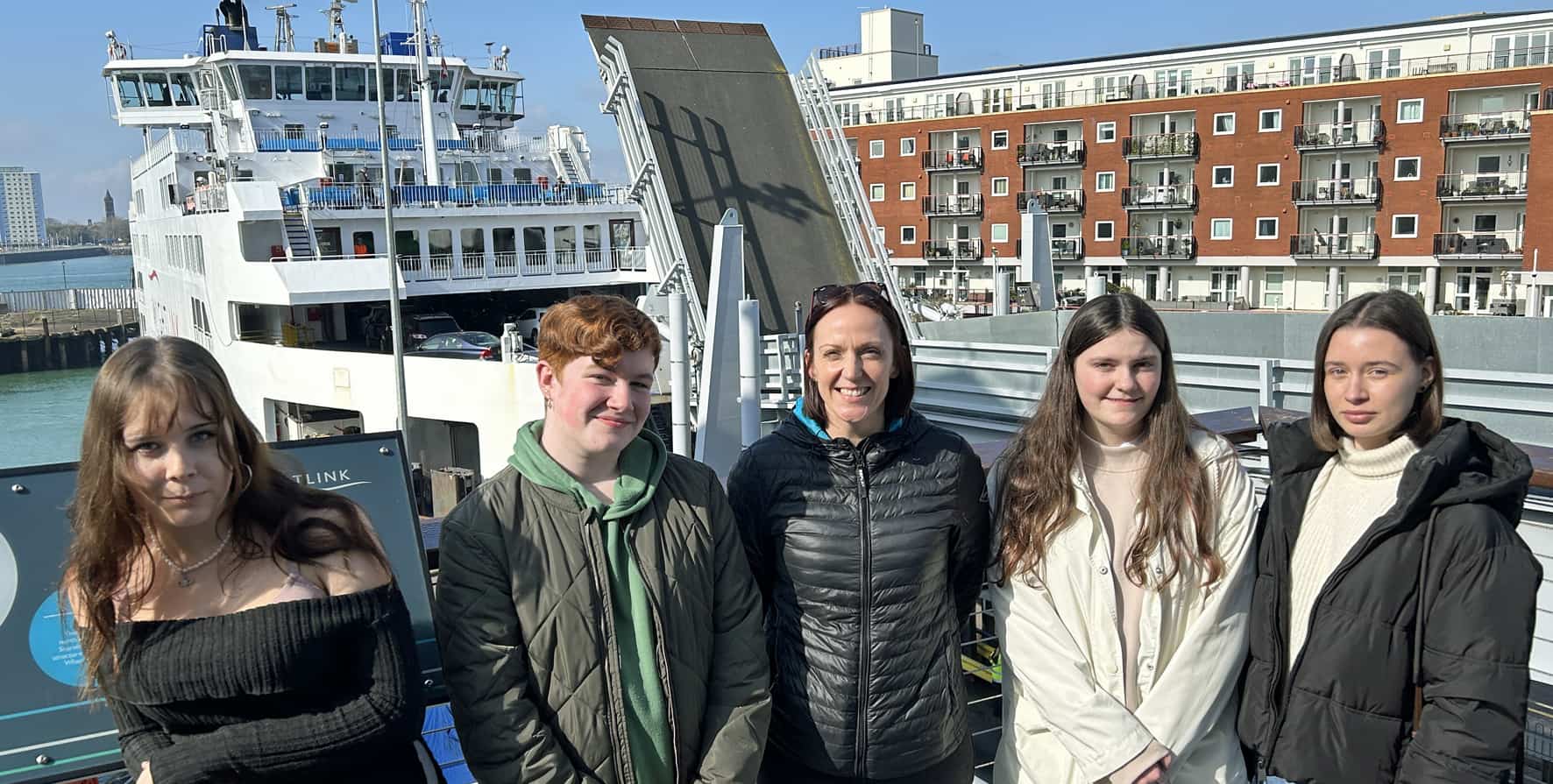 Travel and Tourism students Zakiya, Ewan, Abbie and Uliana with Isle of Wight College tutor Lindsay Davies (centre) at Wightlink’s Camber Café in Portsmouth