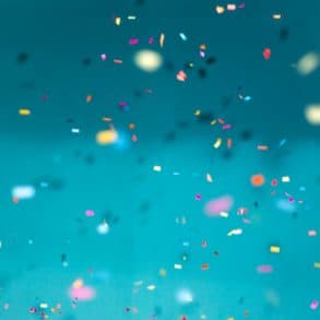 confetti falling with light blue background by jason leung