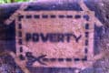 poverty stencil painted on wall