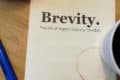 Brevity handbill and Coffee cup