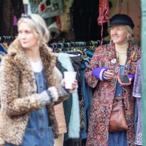 Lucy Whelan and partner at vintage emporium stall by Julian Winslow