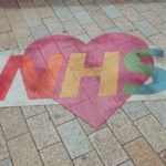 NHS painted on paving