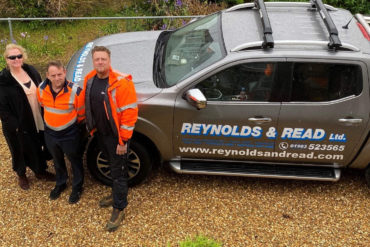 Sight for Wight CEO in car park with Reynolds and Read workers