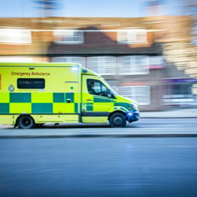 ambulance racing past