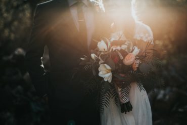 bride and groom in a misty light