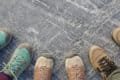 three people's walking boots by emma van sant