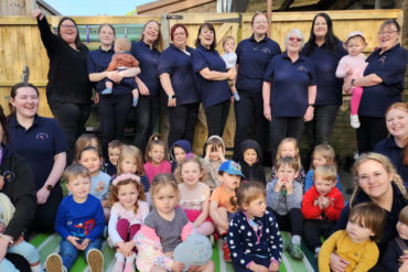 Staff and children at Furzehill Childcare Centre