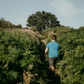 A Rambler walking through a green area on the Isle of Wight