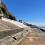 Reinstated seawall apron and revetment