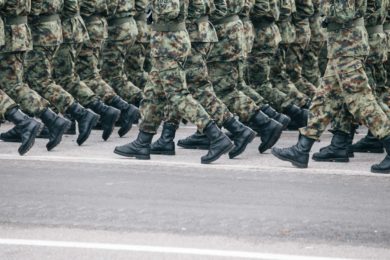 shot of army soldiers marching