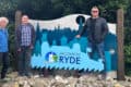 Councillors Malcolm Ross, Simon Cooke and Ian Dore standing by the 'welcome to Ryde sign'