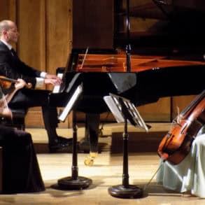 Galos piano trio performing on stage