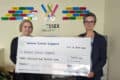 Laura Haytack and Angie White with a giant cheque