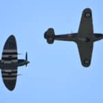Two Spitfires flying overhead