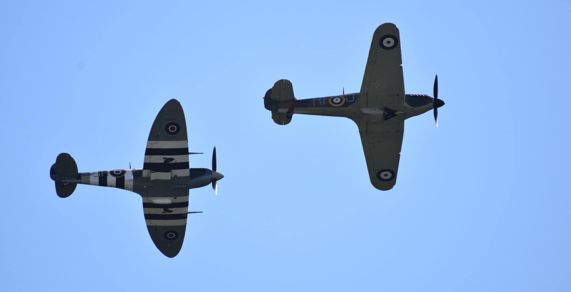 Two Spitfires flying overhead