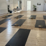 ems yoga studio with mats laid out ready for a class