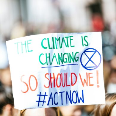 extinction rebellion banner at climate crisis march
