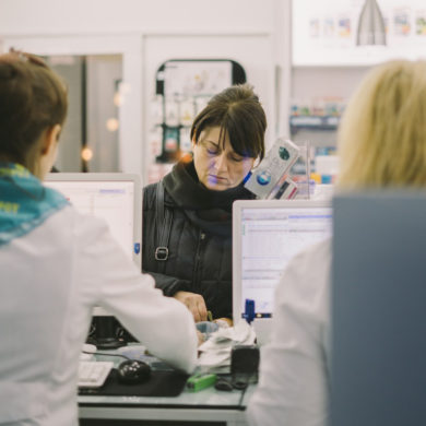 people in a pharmacy