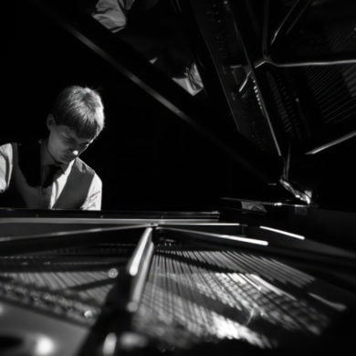 thomas luke playing the piano