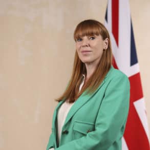 Angela Rayner standing in front of the union flag