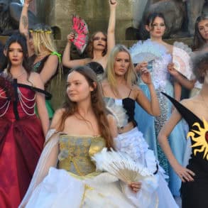 Island VI Form fashion and textile students wearing their ballgowns in St James's Square
