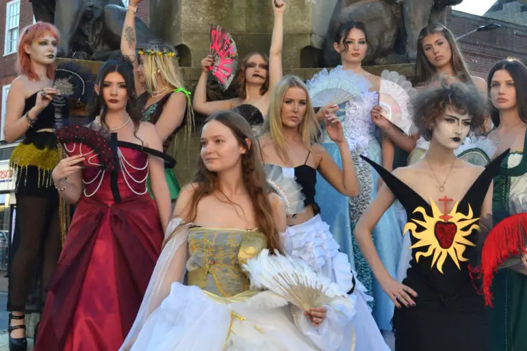 Island VI Form fashion and textile students wearing their ballgowns in St James's Square